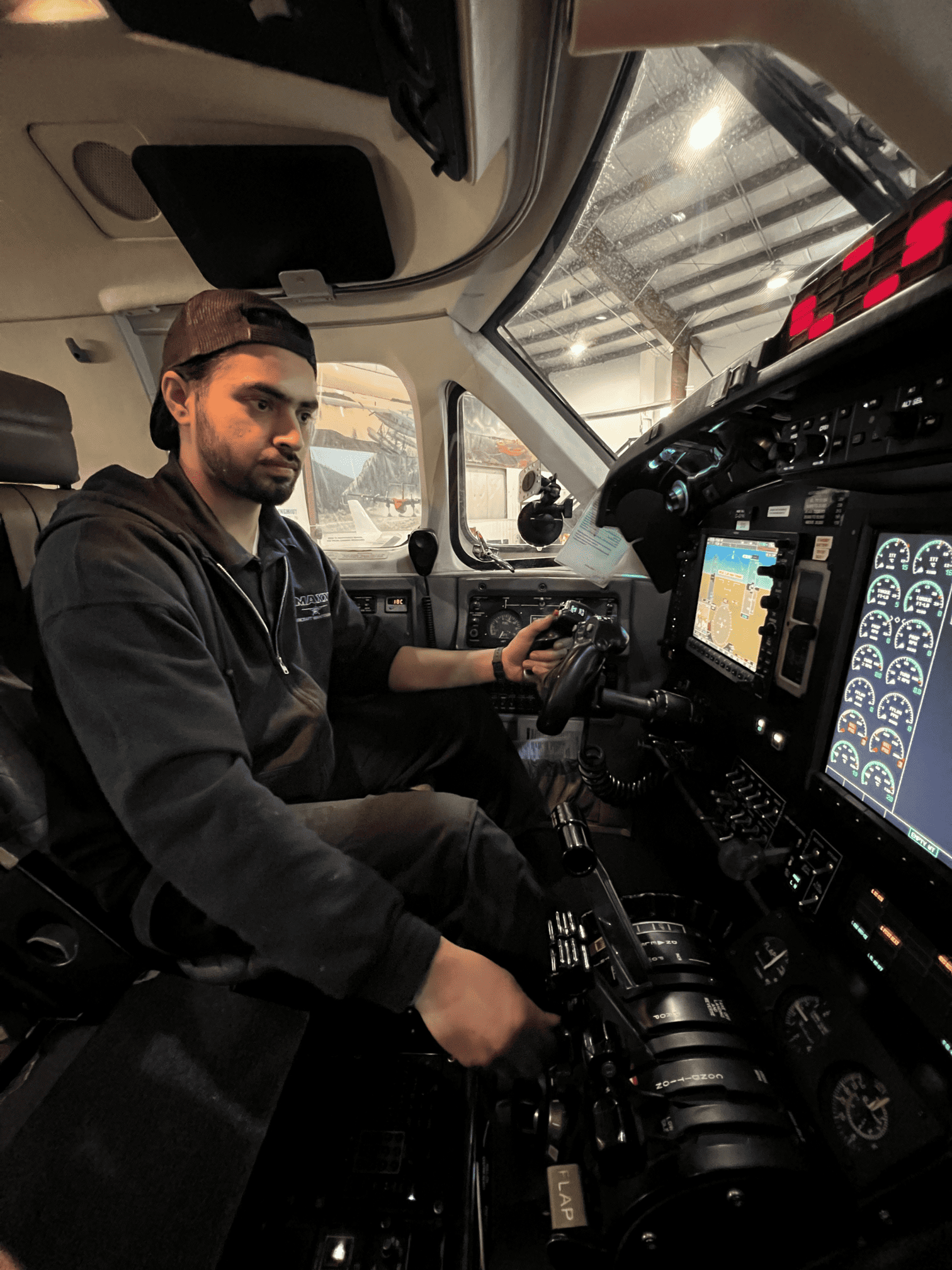 Tools layed out on table with airplane in the background